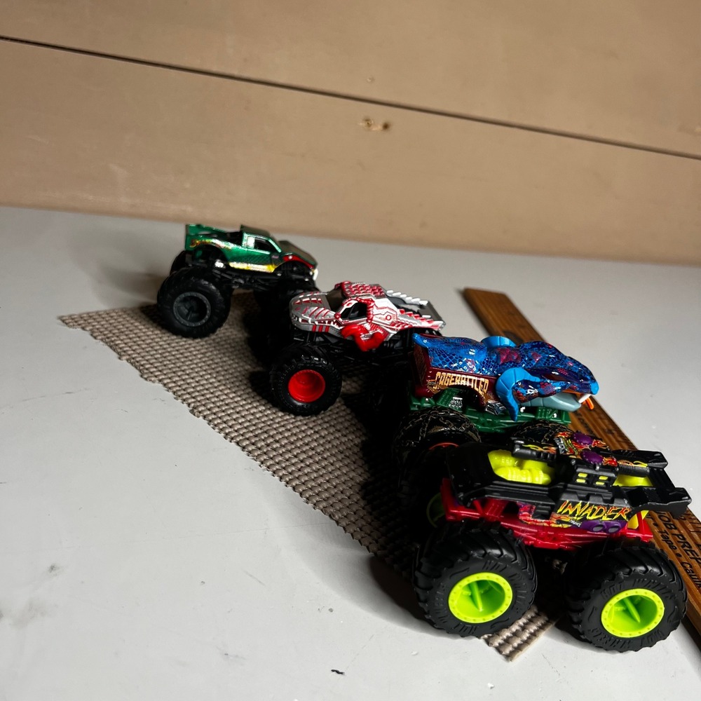 Hot Wheels Monster Trucks Lot of 4 Snake Bite Cage Rattled Invader 1:64 Diecast
